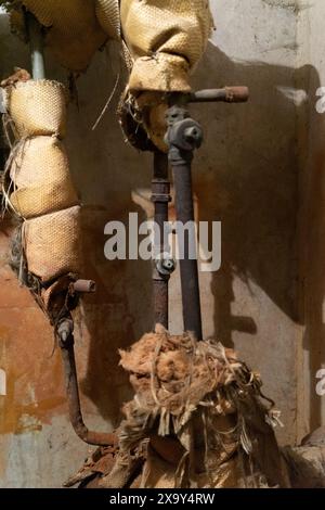 Shut-off fittings on the old water supply. Stock Photo