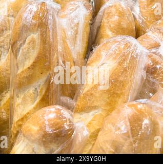 Buns in wicker basket. Composition with bread and rolls Stock Photo