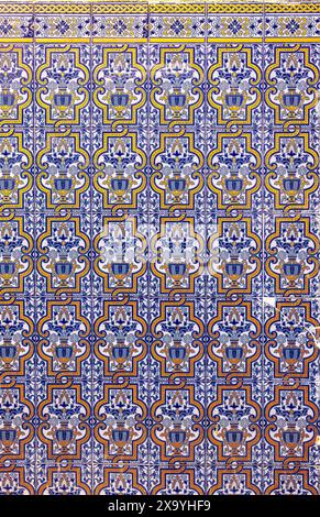 Antiques Portuguese tiles hand painted. Portugal.  Tiled wall background of a downtown of an European city. Stock Photo