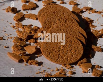 The chocolate cookies with cracks put on the gray surface Stock Photo