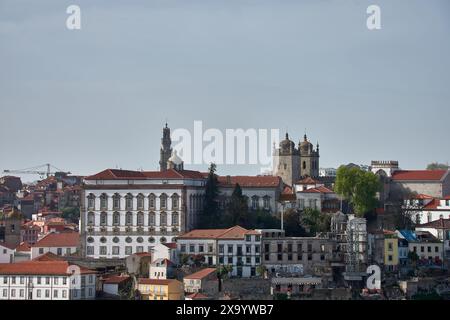 Douro river and local houses with orange roofs in Porto city aerial panoramic view. Porto is the second largest city in Portugal. Stock Photo