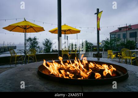 Warming fire pit, Shipyards District, North Vancouver, British Columbia, Canada Stock Photo