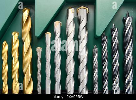 Drill bit set in box isolated on white Stock Photo