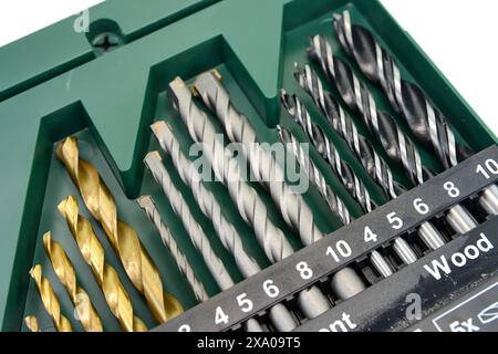 Drill bit set in box isolated on white Stock Photo