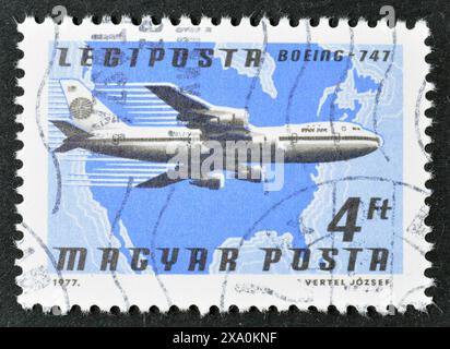 Cancelled postage stamp printed by Hungary, that shows 'Boeing 747 (Pan Am) over North America, circa 1977. Stock Photo