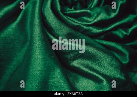 A green silk fabric background Stock Photo