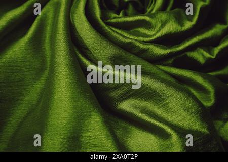 A green silk fabric background Stock Photo