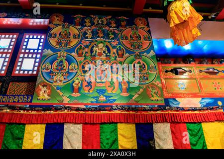 Buddhist temple interior featuring ornate decorations, statues of buddha, and traditional architecture. Serene atmosphere with intricate details, gold Stock Photo