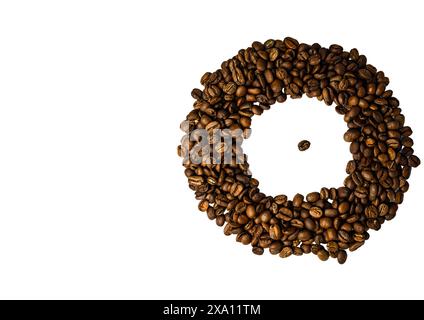The coffee beans displayed on a plain white background. Stock Photo