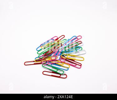 Assortment of paper clips on white background Stock Photo