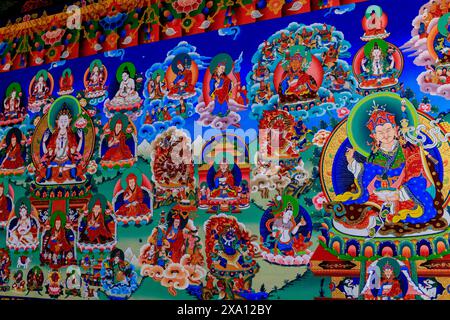 Buddhist temple interior featuring ornate decorations, statues of buddha, and traditional architecture. Serene atmosphere with intricate details, gold Stock Photo