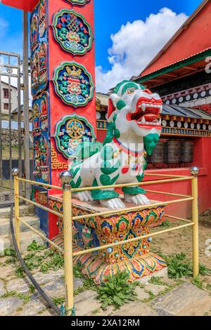 Buddhist temple interior featuring ornate decorations, statues of buddha, and traditional architecture. Serene atmosphere with intricate details, gold Stock Photo