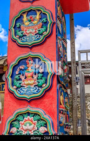 Buddhist temple interior featuring ornate decorations, statues of buddha, and traditional architecture. Serene atmosphere with intricate details, gold Stock Photo