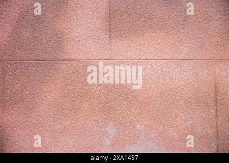 Close up Photograph of a Textured, Patterned wall on the facade of a historic buildung in El Papiol, Spain Stock Photo