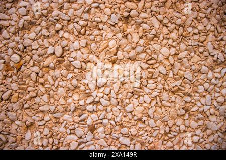 Close up Photograph of a Textured, Patterned wall on the facade of a historic buildung in El Papiol, Spain Stock Photo
