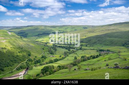 Looking down Swaledale from Kisdon Hill from above Muker in early summer. Yorkshire Dales National Park, UK. Stock Photo