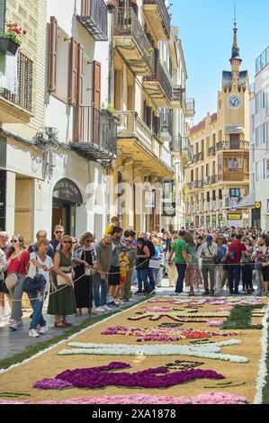 Sitges, Barcelona, Spain-June 03, 2024: Festive scene in Sitges during Corpus Christi, highlighting the traditional architecture and floral carpets th Stock Photo