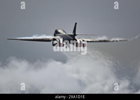 Yigo, United States. 31 May, 2024. A U.S. Air Force B-1B Lancer supersonic stealth strategic bomber aircraft, assigned to the 37th Expeditionary Bomb Squadron, climbs out after taking off from Andersen Air Force Base, May 31, 2024, in Yigo, Guam.  Credit: SSgt. Jake Jacobsen/U.S. Air Force Photo/Alamy Live News Stock Photo