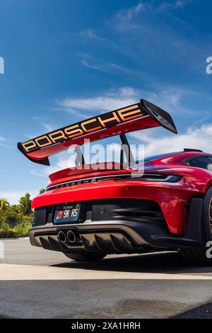 A stunning Guards Red 992 Porsche GT3 RS with Aurum Gold wheels Stock Photo