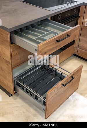 High angle view of empty kitchen drawers with dividers and organizers Stock Photo