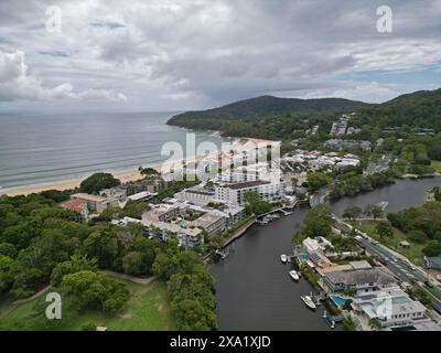Aerial view of beach, buildings, and water from a helicopter in Noosa River, Noosa Heads, Queensland, Australia Stock Photo