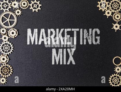 MARKETING MIX word written on wood block. MARKETING MIX text on cement table for your desing, concept. Stock Photo