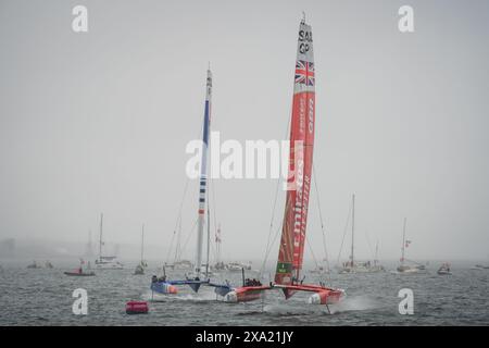 Team Great Britain leading boats from France and Denmark during the finals of the June 2024 Sail GP event in Halifax, Nova Scotia, Canada. Stock Photo