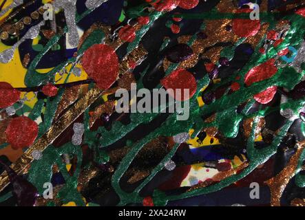 A close-up of vibrant nail polish splashes Stock Photo