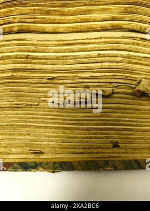 A vertical closeup of old book pages Stock Photo
