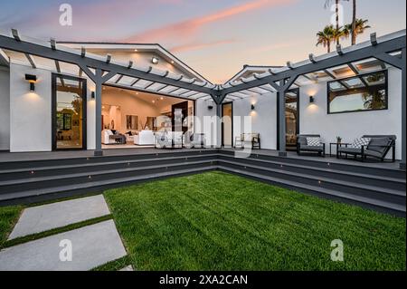 An outdoor seating area in a modern new construction home in Los Angeles Stock Photo