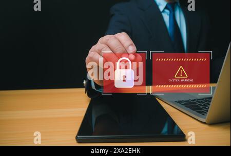 Businessman working on tablet and computer online showing protection icons cyber espionage, Represents the code protection, Security concept and commu Stock Photo
