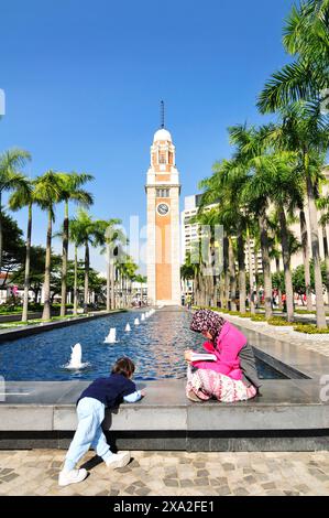 The former Kowloon-Canton railway clock tower in Tsim Sha Tsui, Hong Kong. Stock Photo