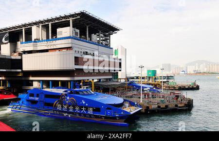 Turbojet ferries to Macau docking at the Macau ferry terminal in Sheung Wan, Hong Kong. Stock Photo