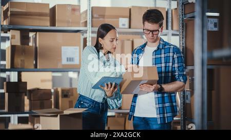 Portrait of a Small Business Owner and Co-Founder Checking Inventory with Tablet Computer in Retail Warehouse full of Shelves with Goods. Working in Logistics, Online Shop Distribution Center. Stock Photo