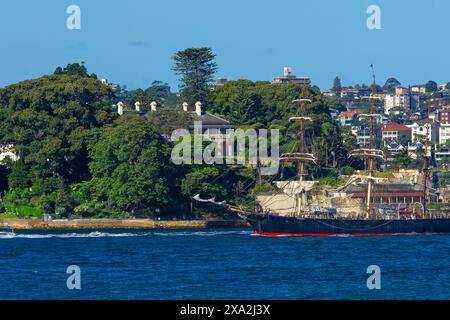 Sydney Harbour in Australia, including the James Craig barque and Admiralty House, the official Sydney residence of the Governor-General of Australia. Stock Photo