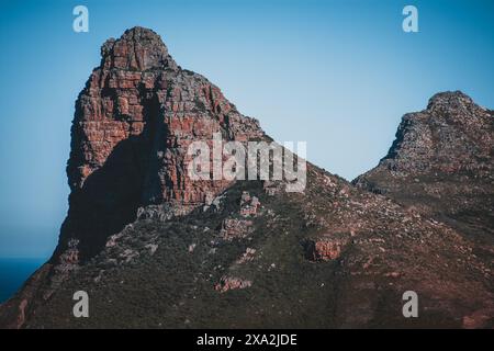 Experience the awe-inspiring beauty of South Africa's red rock mountains, with their rugged cliffs and dramatic formations, captured in stunning detai Stock Photo