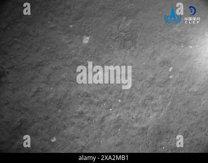 (240604) -- BEIJING, June 4, 2024 (Xinhua) -- This image released by the China National Space Administration (CNSA) on June 4, 2024, which was taken with the landing camera on the lander of Chang'e-6 probe, shows a view of the lunar surface. The ascender of China's Chang'e-6 probe lifted off from lunar surface on Tuesday morning, carrying samples collected from the moon's far side, an unprecedented feat in human lunar exploration history. The ascender has entered a preset orbit around the moon, said the China National Space Administration (CNSA). (CNSA/Handout via Xinhua) Stock Photo