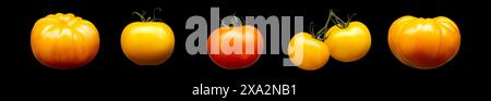 Set of tomatoes. oranges and apples isolated on black background with clipping path Stock Photo