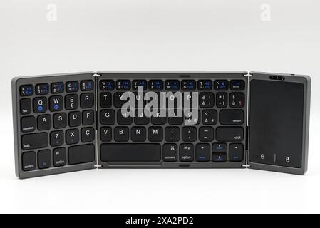 Portable keyboard for laptop isolated on white background. Foldable keyboard Stock Photo