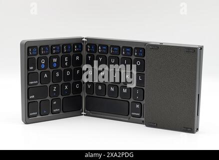 Portable keyboard for laptop isolated on white background. Foldable keyboard Stock Photo