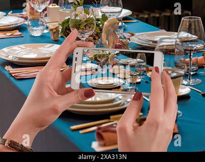 Festive table setting photographed with a mobile phone Stock Photo