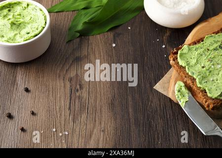 Wild garlic butter on wholemeal bread Stock Photo