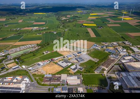 Aerial view, industrial estate Hinterm Gallberg and Nehdener Weg, with fallow land, Hunderbecke river meander, meadows and fields and wind turbine, Br Stock Photo