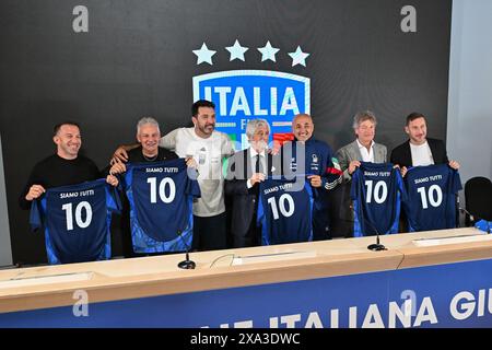 Florence, Italy. 03rd June, 2024. Italian former player Alessandro Del Piero, Italian former player Roberto Baggio, Italian former player Gianni Rivera, Chief of Italian delegation Gianlugi Buffon, Head coach of Italy Luciano Spalletti, Italian former player Giancarlo Antognoni and Italian former player Francesco Totti show the shirt for the day of the â&#x80;&#x98;Fantastic Fiveâ&#x80;&#x99; number 10s during Press conference, UEFA European Football Championship in Florence, Italy, June 03 2024 Credit: Independent Photo Agency/Alamy Live News Stock Photo