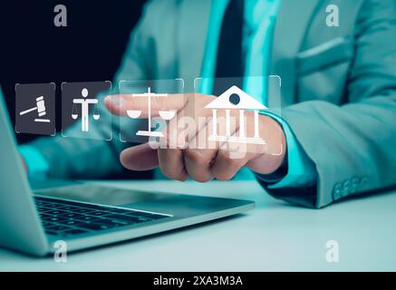 Businessman pointing his finger at virtual global law icons on  for business legal advice, Labor law, Attorney at law, Legal advice business concept, Stock Photo