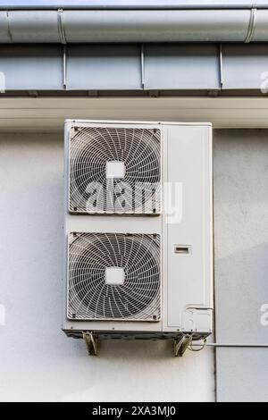 Dual Inverter, combination of heating and cooling pump, installed on industrial building Stock Photo