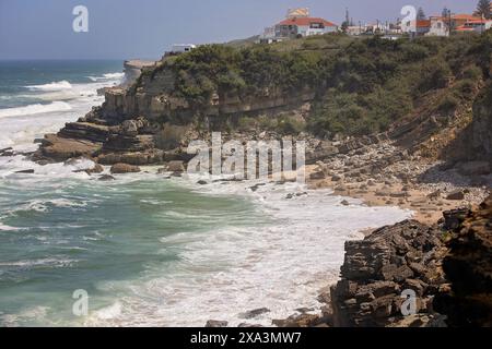 Family with children, siblings, visiting the most west point of Europe, Cabo Da Roca, during family vacation summertime in Portugal Stock Photo