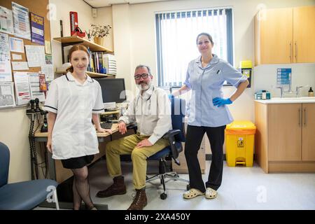 Medical staff in an office setting in a medical practice Stock Photo