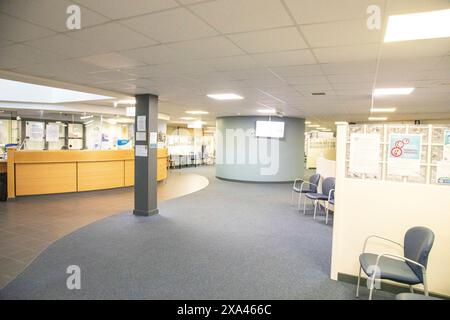 Empty Spacious waiting area with chairs and bulletin boards in a medical practise Stock Photo