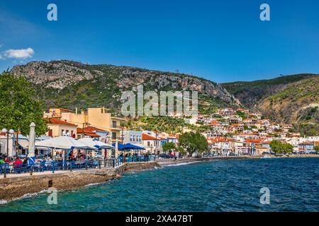 Restaurants at waterfront in town of Limni, North Euboean Gulf, Aegean Sea, northern Evia island, Central Greece region, Greece Stock Photo